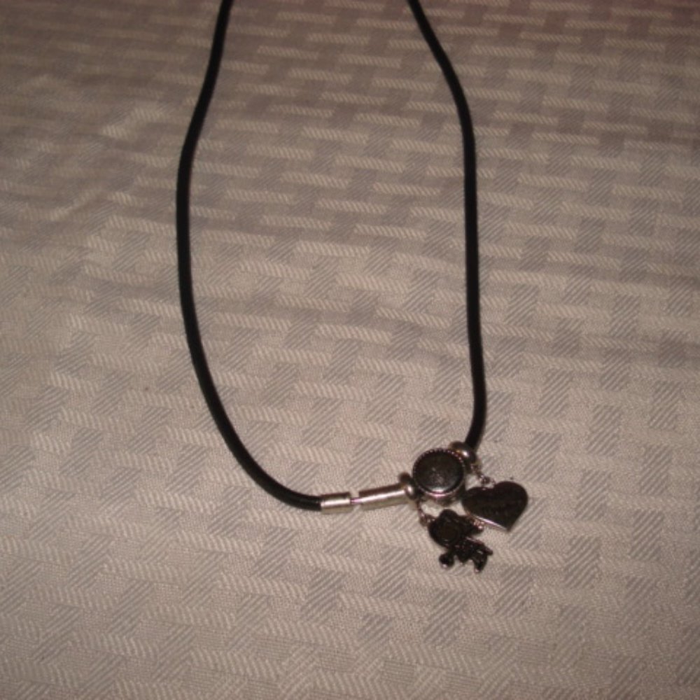 4 for 25... Black leather choker w/charms